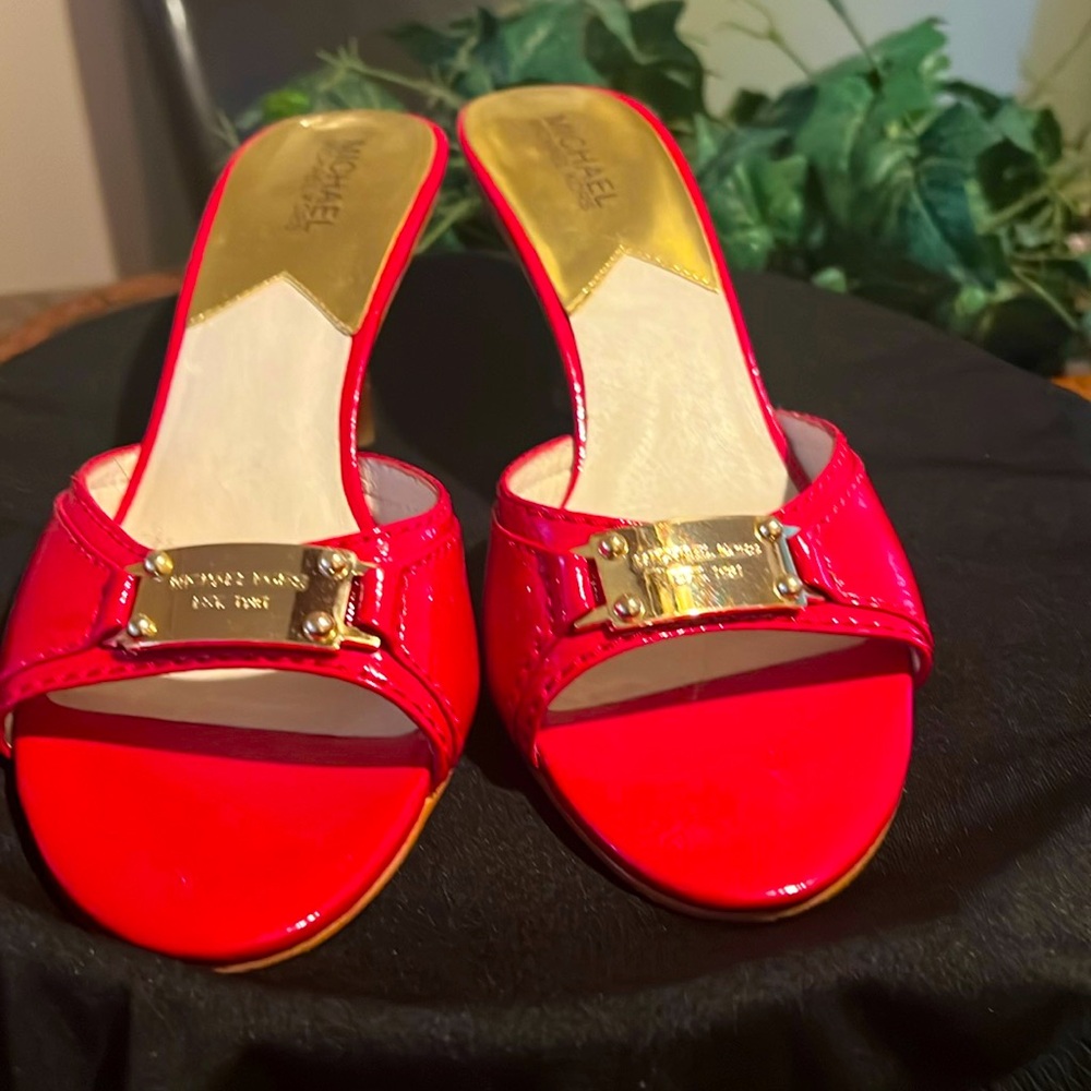 Red patent leather slip on dress shoes slightly worn and very comfortable.
